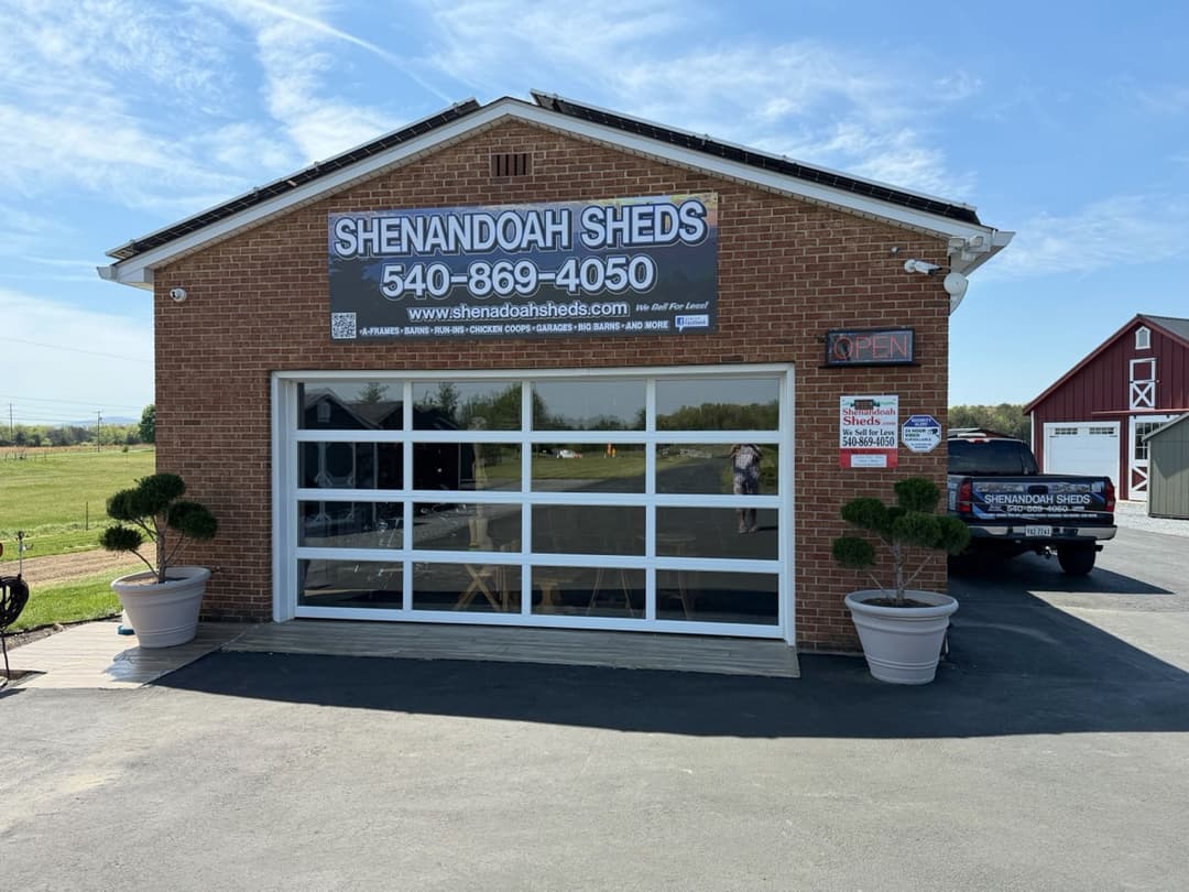 Shenandoah Sheds lot in White Post, VA — branded showroom with open garage door