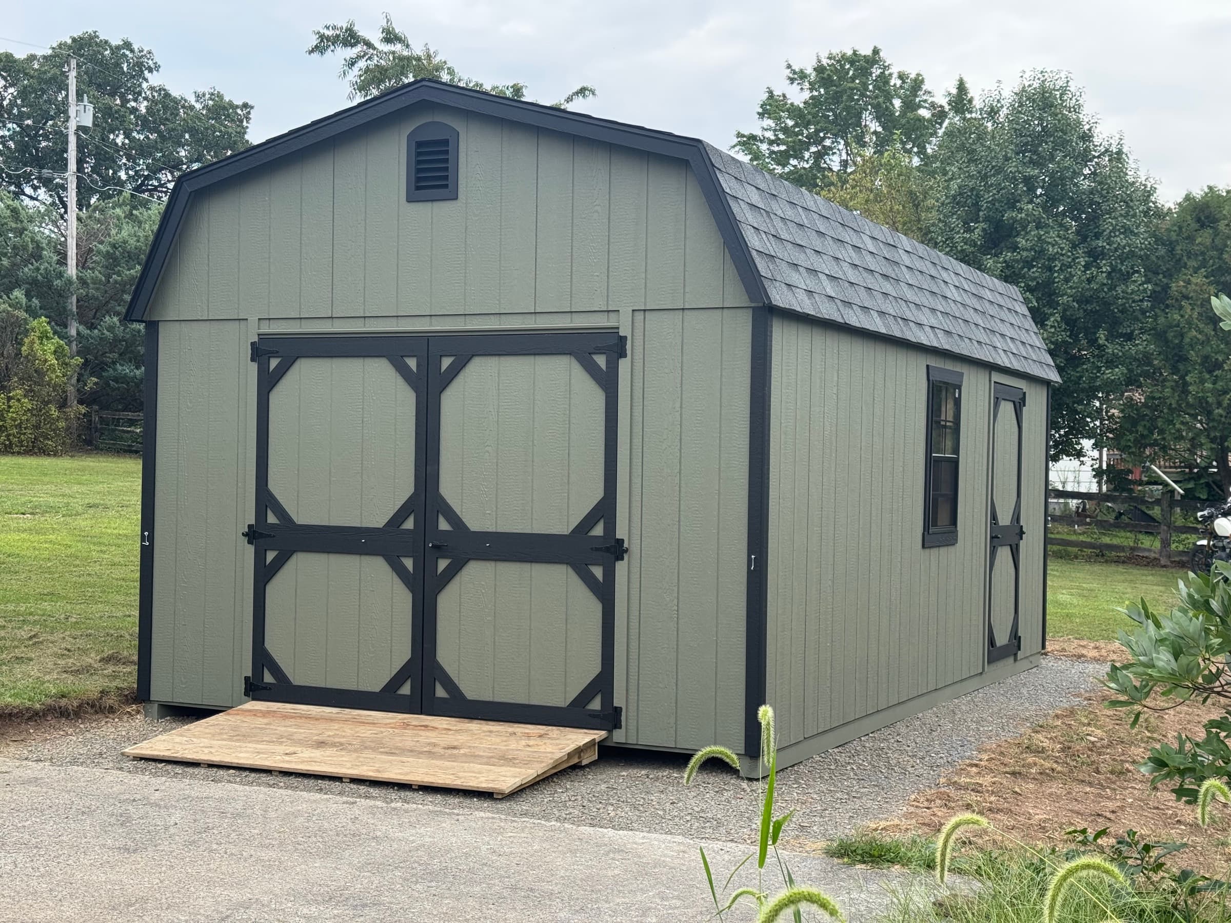 A Sage Barn Shed Built for Sawdust and Motorcycles in Winchester — photo 1