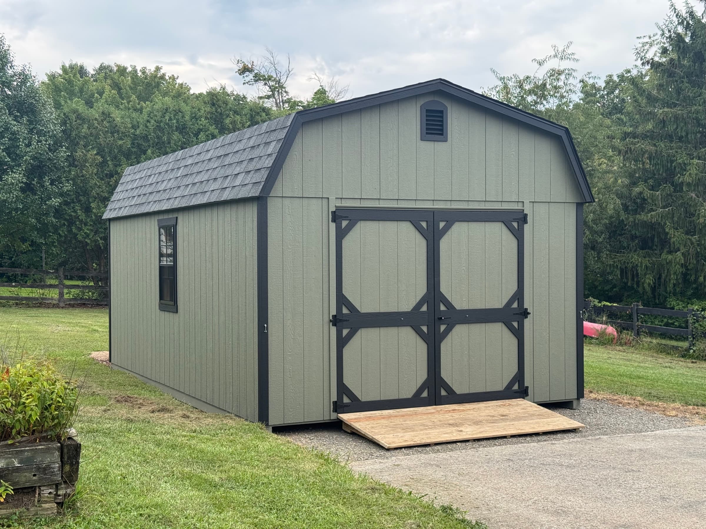 A Sage Barn Shed Built for Sawdust and Motorcycles in Winchester — photo 2