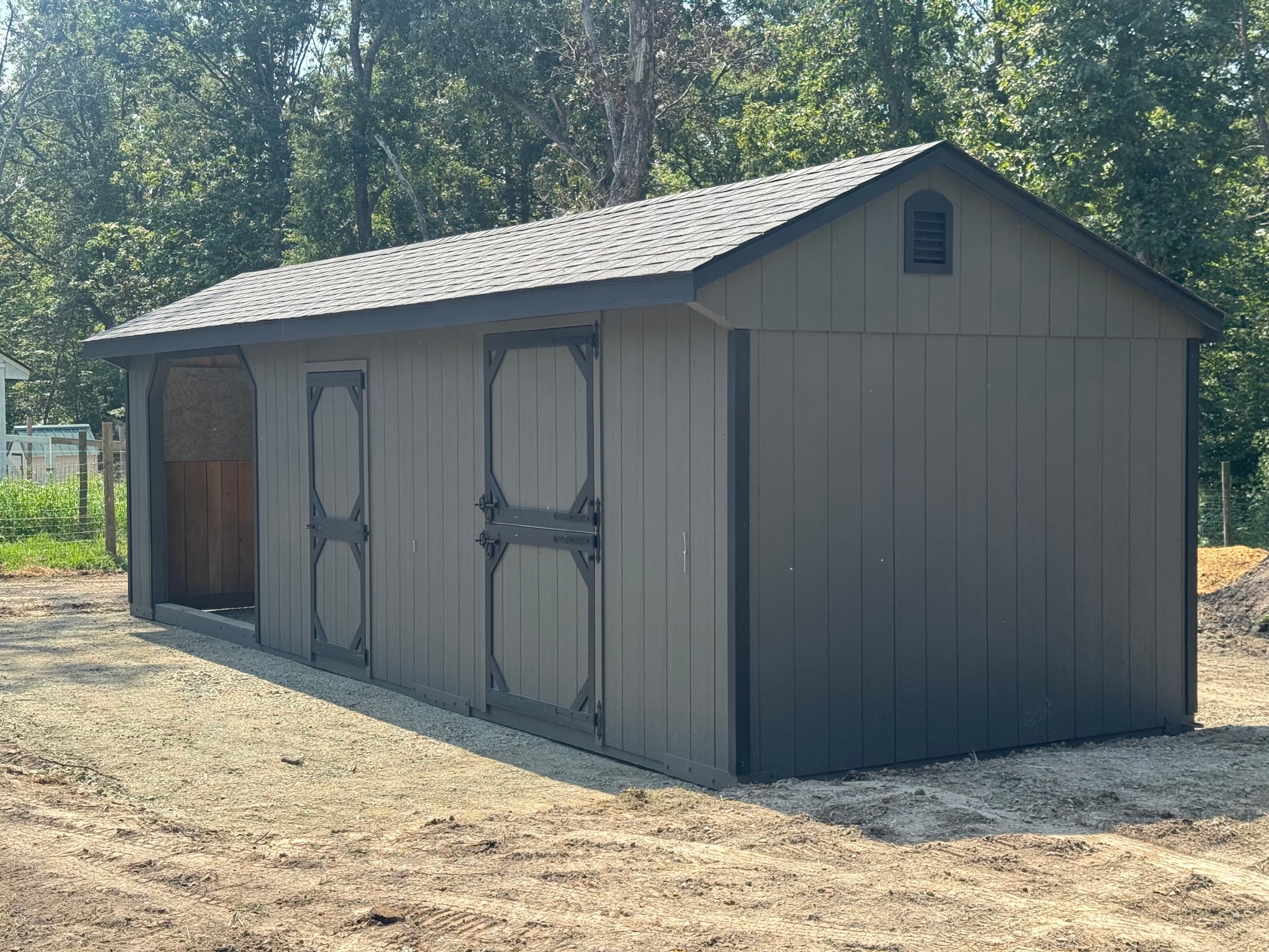 A 10x30 Row Barn Finds Its Home — and Some Happy Goats — in Goldvein